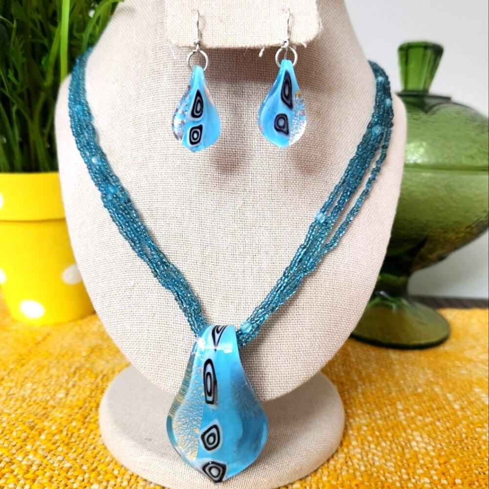 Blue glass beaded pendant necklace and earrings multi strand chain
